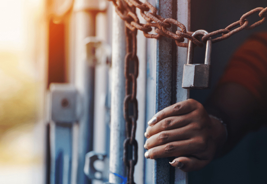 Image of a locked storage container being opened
