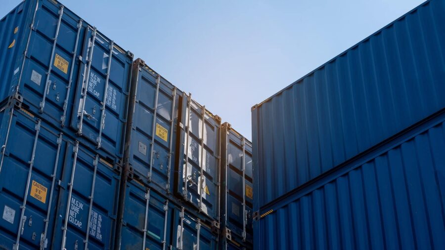 Image of blue storage containers stack on top of each other