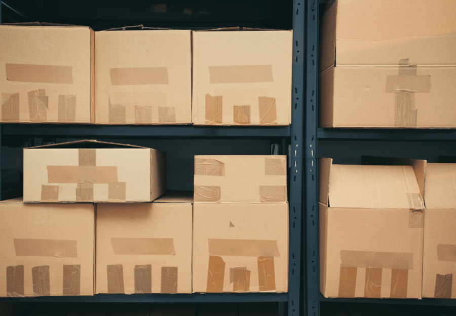 Image of a storage container shelf with packed boxes.