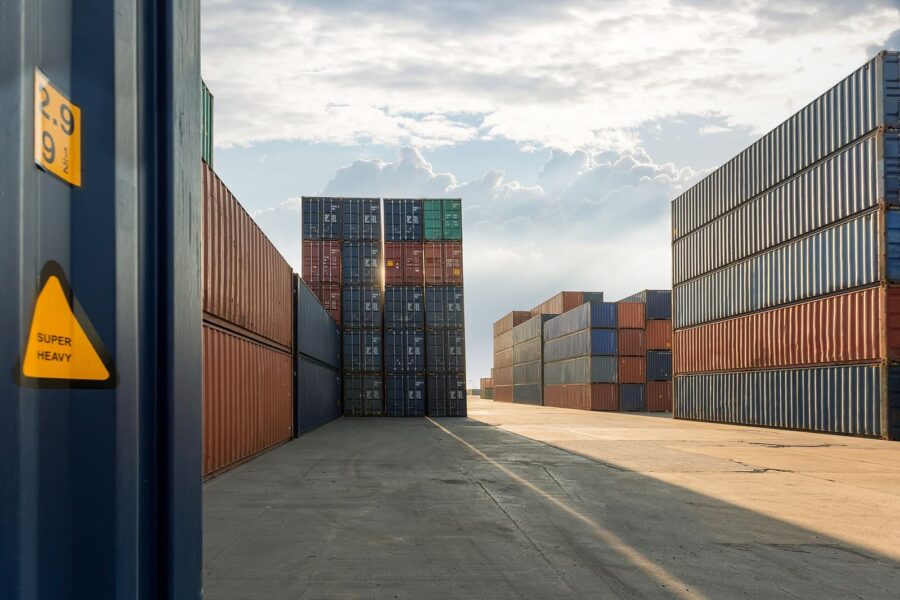 An industrial space with storage containers stacked on top of each other